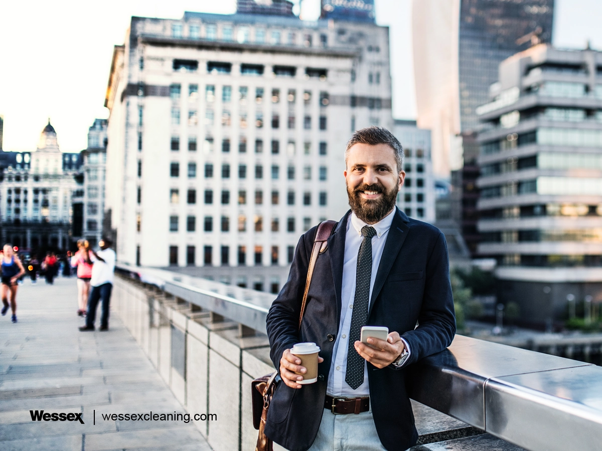 Businessman smiling while understanding SDS compliance for workplace safety