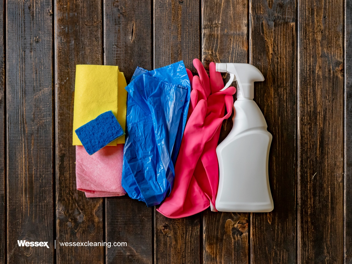 Eco-friendly cleaning supplies on a wooden surface