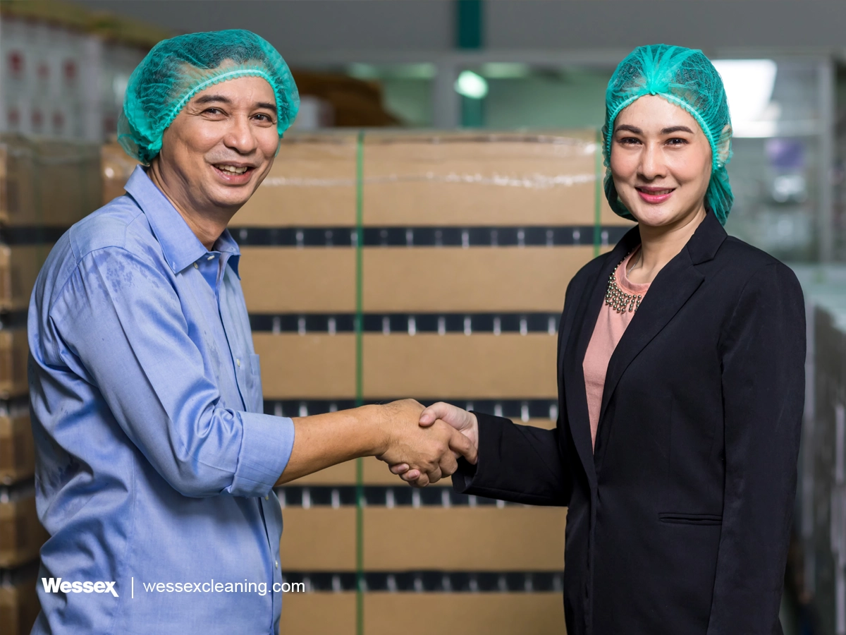 Businesspeople shaking hands after agreeing on a purchase decision