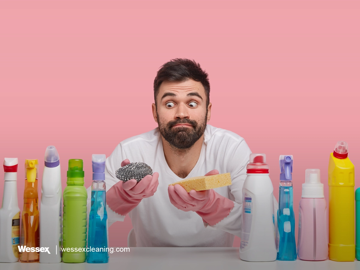 Surprised man in casual clothes showing shock, representing hidden costs of too many cleaning products